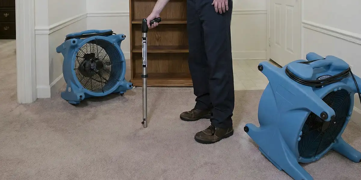 emergency water removal equipment deployed to dry a flooded residential interior in Louisville, KY