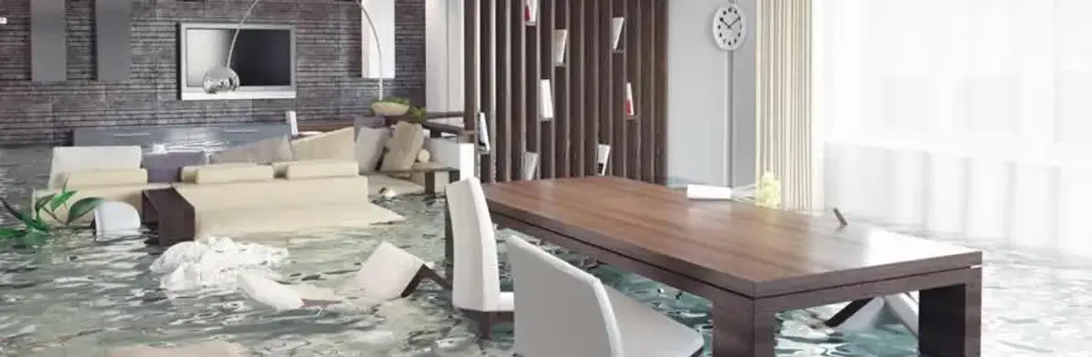 home interior affected by water damage with flooded floors and displaced furniture in Louisville, KY